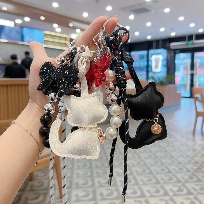 Cute Leather Cat Bag Charm Keychain with Pearl & Bowknot for Women