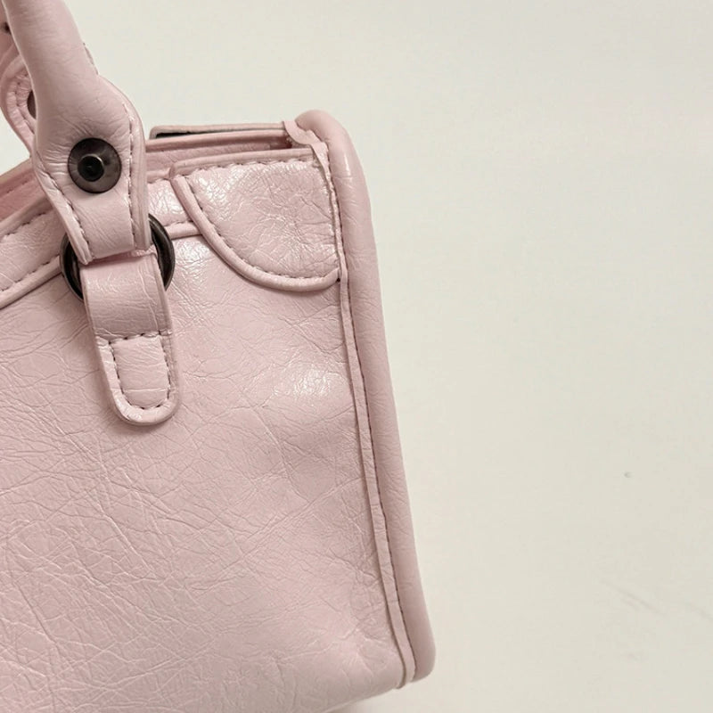 Motorcycle-Style Women's Crossbody Handbag with Tassel Detail