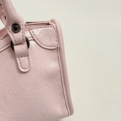 Motorcycle-Style Women's Crossbody Handbag with Tassel Detail