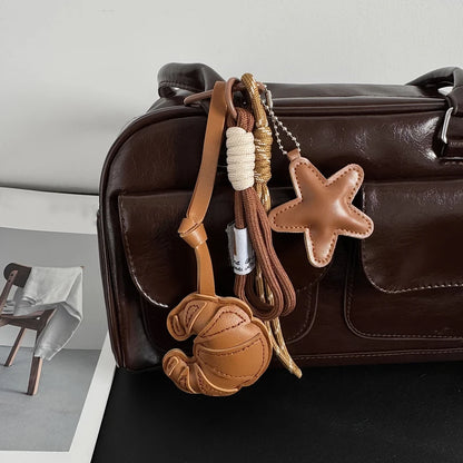 Leather Croissant Keychain – Handmade Star Charm & Braided Rope