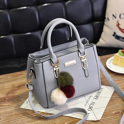 PU Leather Handbag for Women – Crossbody Bag with Fur Ball Charm