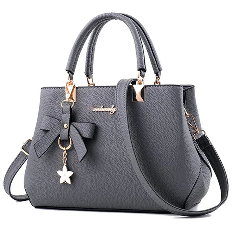 Women's Designer Handbag – Bow Accent & Star Charm Tote