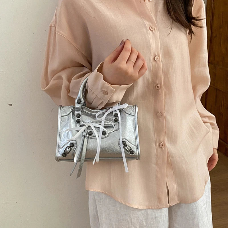 Motorcycle-Style Women's Crossbody Handbag with Tassel Detail
