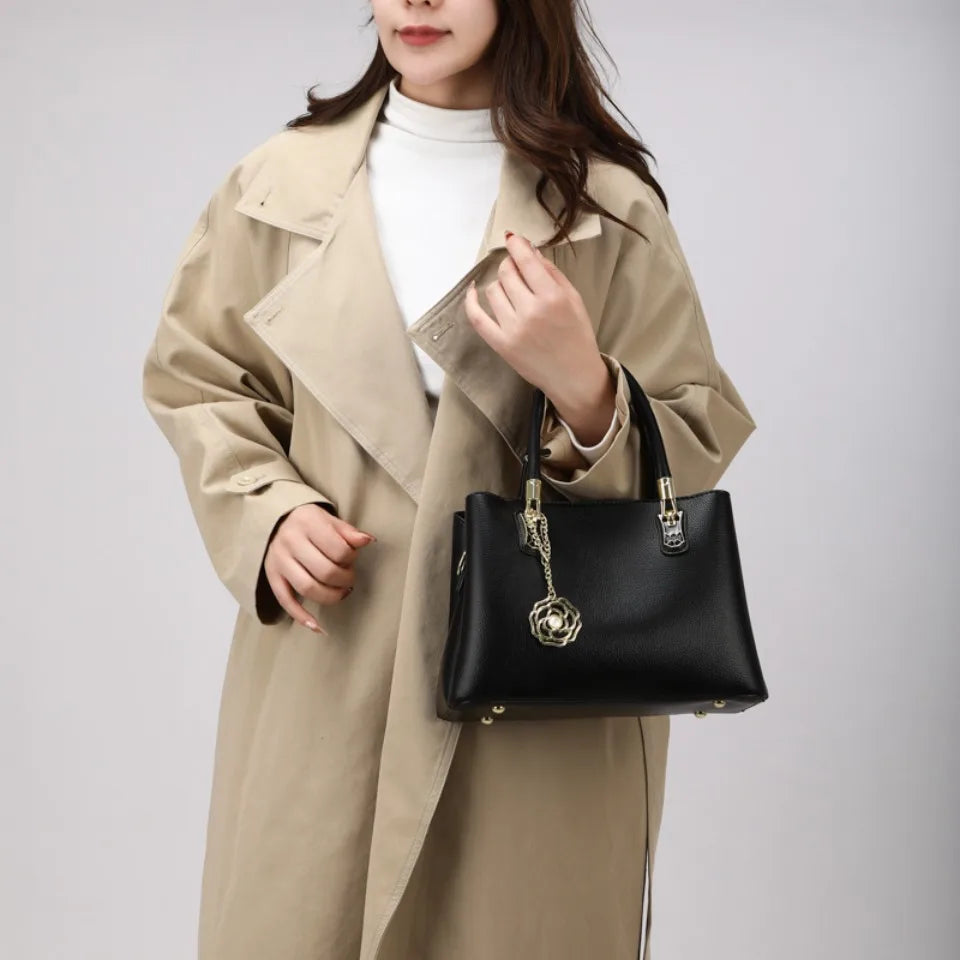 Women's Leather Tote Bag with Gold Hardware & Flower Pendant