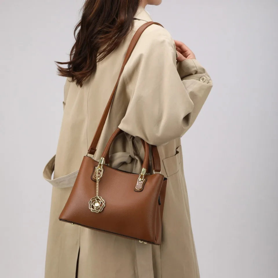 Women's Leather Tote Bag with Gold Hardware & Flower Pendant