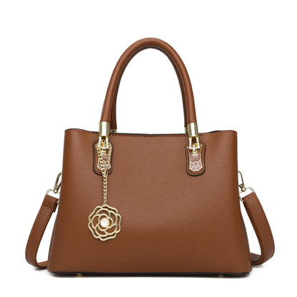 Women's Leather Tote Bag with Gold Hardware & Flower Pendant