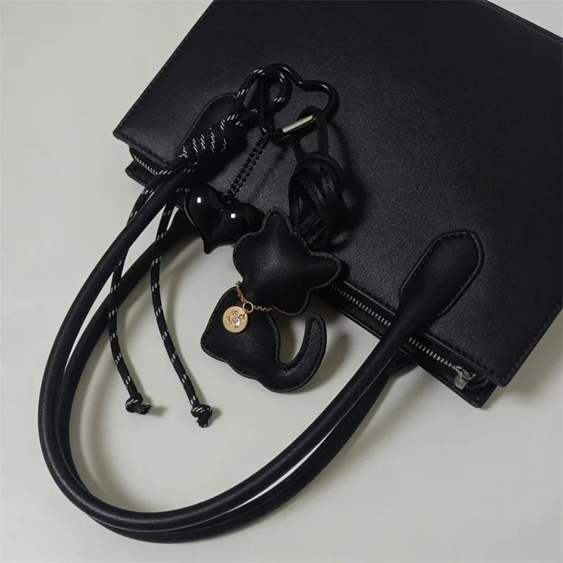 PU Leather Cat Bag Charm with Bow & Rope Tassel Pendant