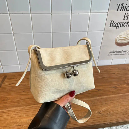 Mini Dumpling Purse with Metal Ball Clasp – Suede Shoulder Bag