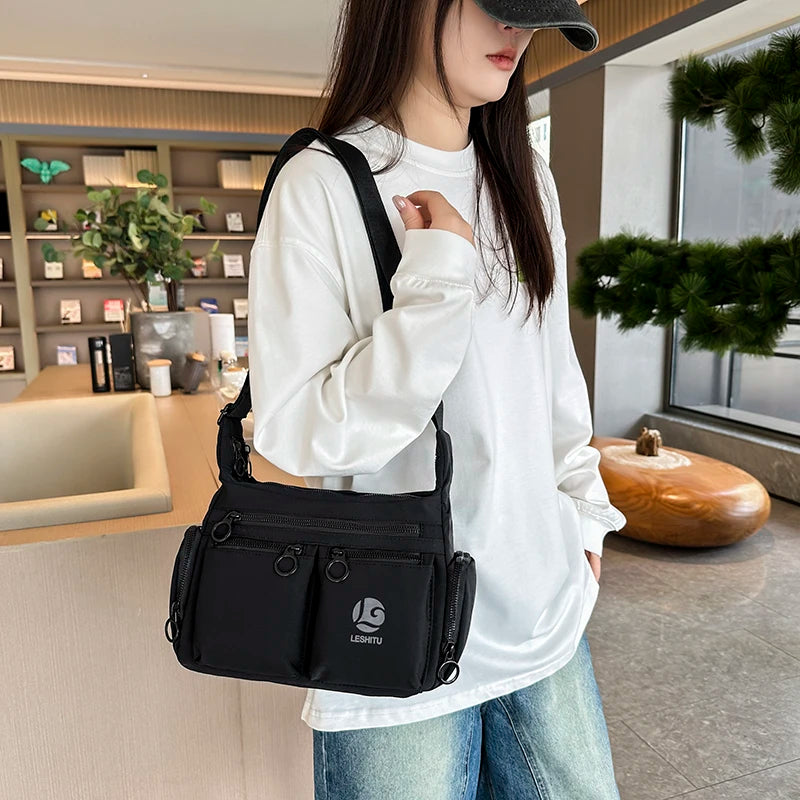 Unisex Water-Resistant Crossbody Sling Bag – Large Capacity Multi-Pocket