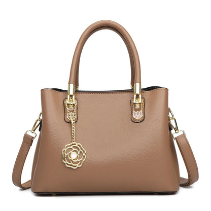 Women's Leather Tote Bag with Gold Hardware & Flower Pendant