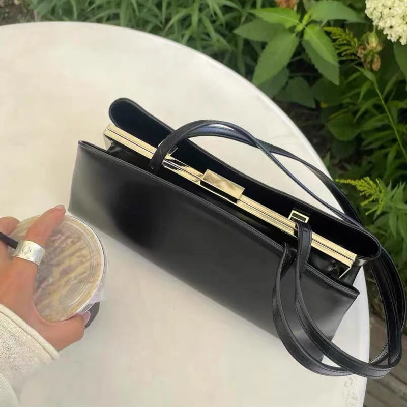 Luxury Leather Handbag with Gold Magnetic Clasp – Minimalist Tote