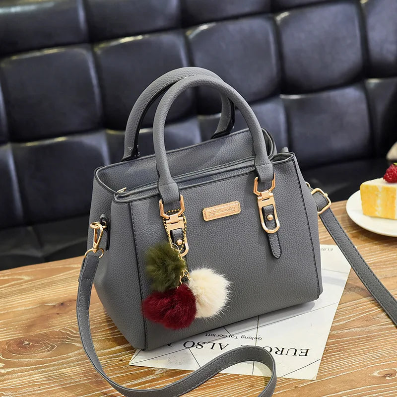 PU Leather Handbag for Women – Crossbody Bag with Fur Ball Charm