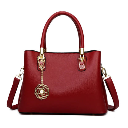 Women's Leather Tote Bag with Gold Hardware & Flower Pendant