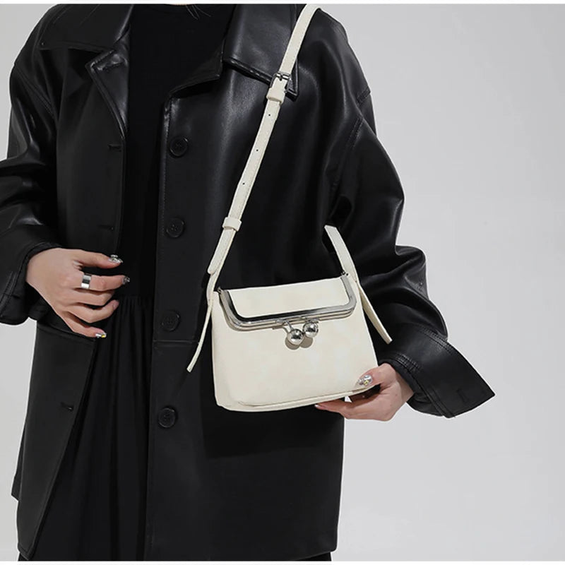 Mini Dumpling Purse with Metal Ball Clasp – Suede Shoulder Bag