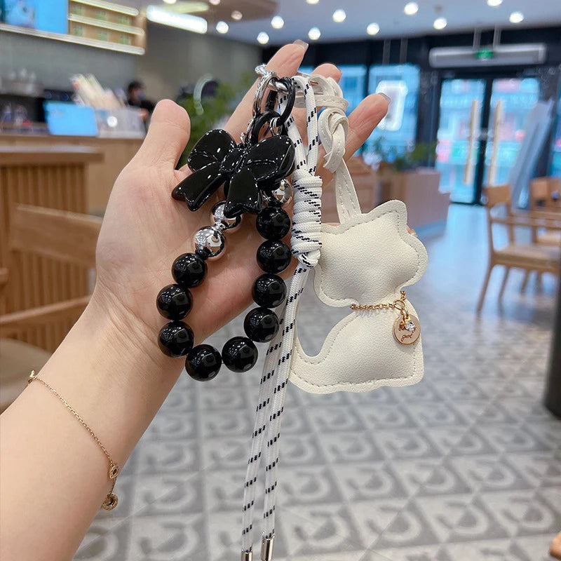 Cute Leather Cat Bag Charm Keychain with Pearl & Bowknot for Women